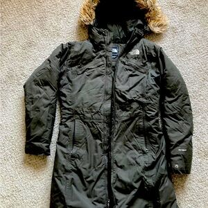 The North Face Arctic Parka! Goose down, wind and water proof!Excellent.
